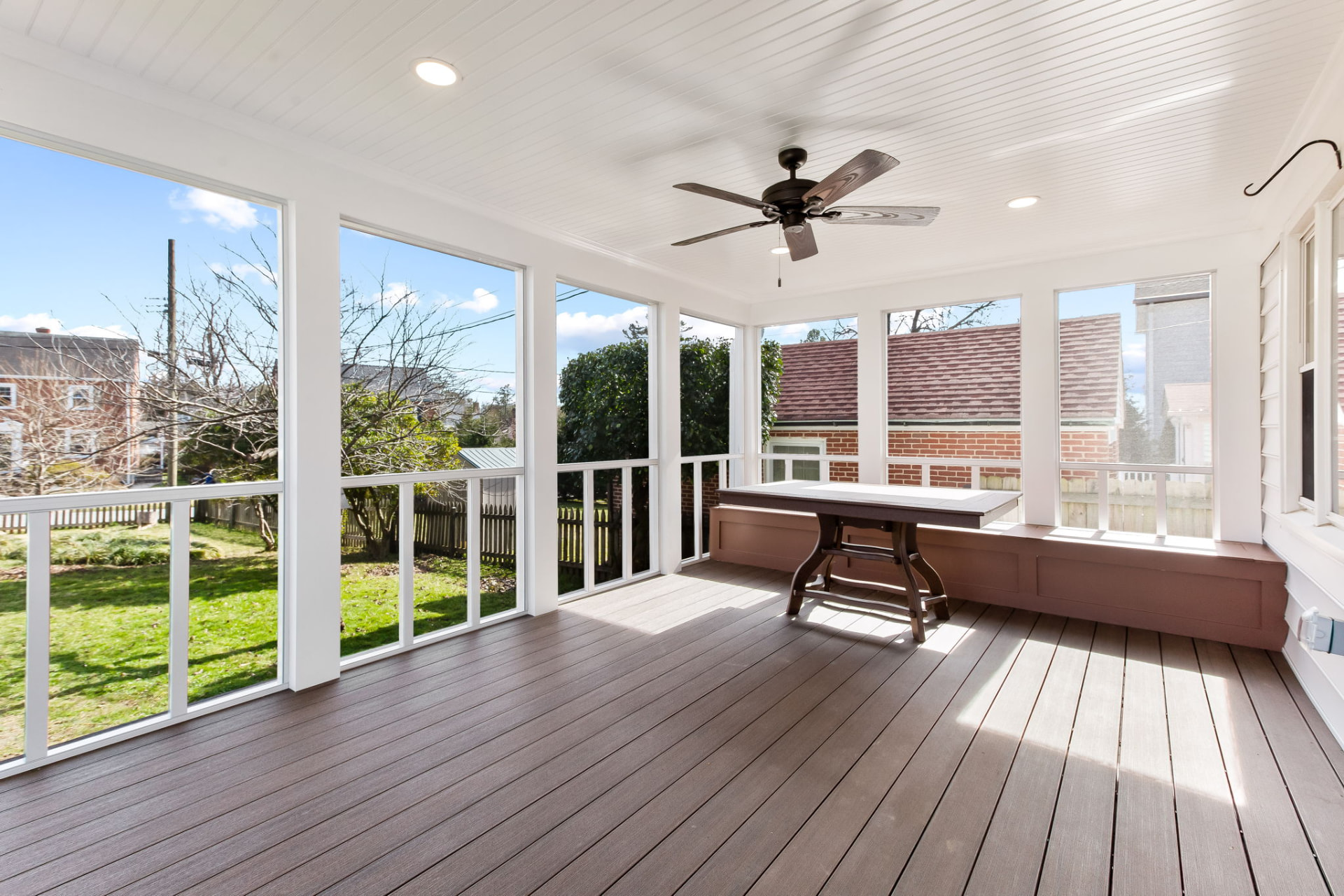 Scherr screened porch interior with beadboard ceiling and ceiling fan